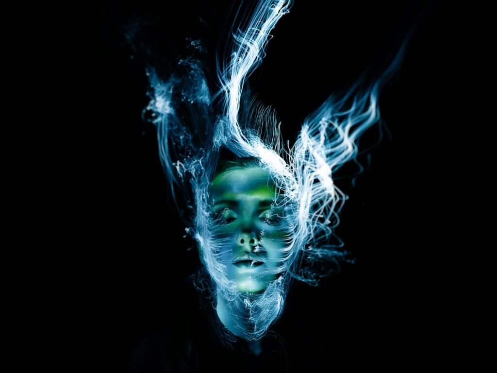Stop Night Shift Weight Gain: 8 Proven Metabolism Boosters 5 A hauntingly beautiful portrait of a woman with abstract light effects creating a surreal, ethereal appearance.