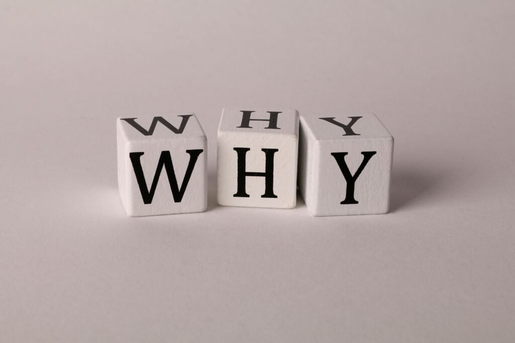 What to Do When Night Shift Insomnia Won't Go Away: Breaking the Cycle 2 Close-up of lettered dice spelling 'WHY' on a neutral background, ideal for concepts of inquiry or curiosity.