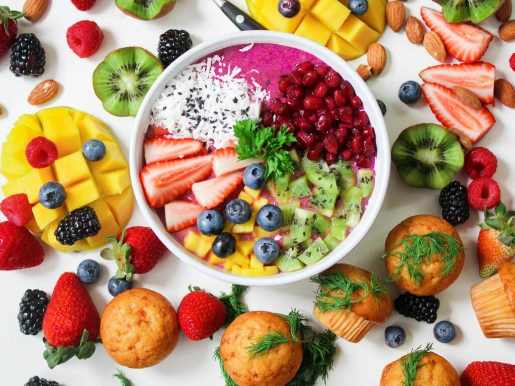 What to Do About Night Shift Depression: Recognition and Self-Care Steps 8 Vibrant smoothie bowl topped with assorted fresh fruits and muffins, perfect for a healthy snack.