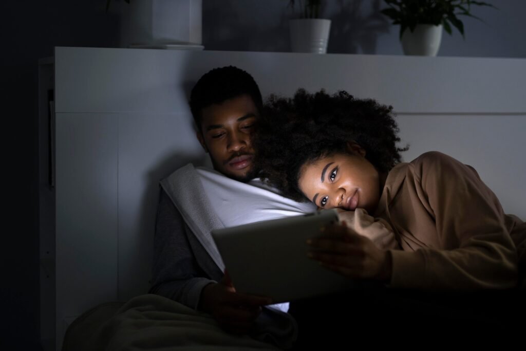 couple watching streaming service home indoors 1