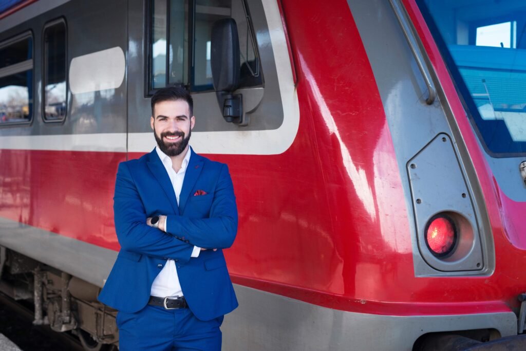 portrait young bearded train driver blue uniform proudly standing front modern subway train 1