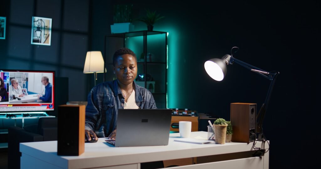 teleworker working from home typing laptop keyboard close up 1