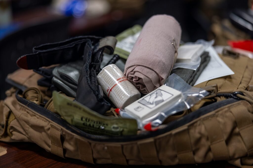 Night Shift Survival Kit: Everything You Actually Need to Function on Overnights 2 Night shift survival kit essentials including blackout sleep mask, insulated food container, blue-blocking glasses, and water bottle laid out for overnight workers