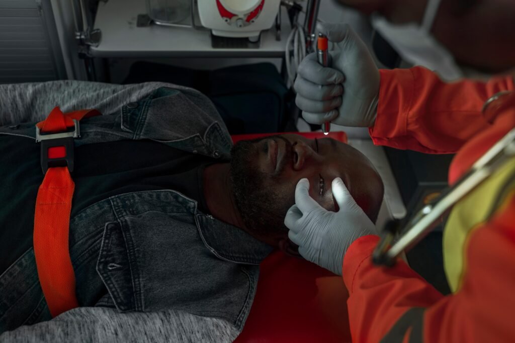 high angle paramedic checking man 1