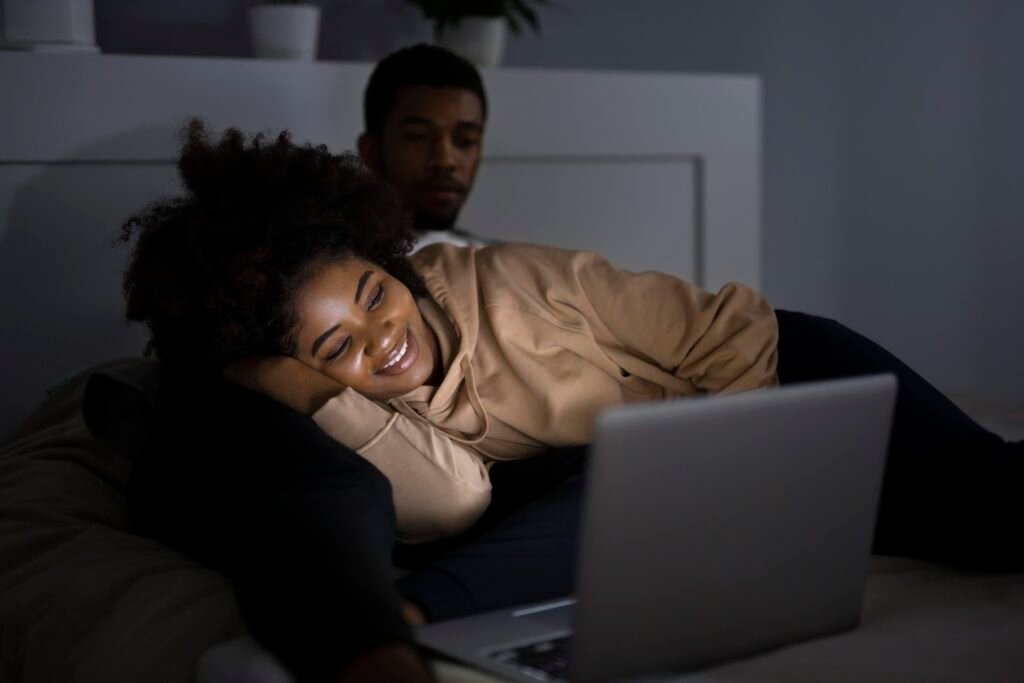 Night Shift and Relationships: What Overnight Work Actually Does to the People You Love 4 african american couple watching streaming service together