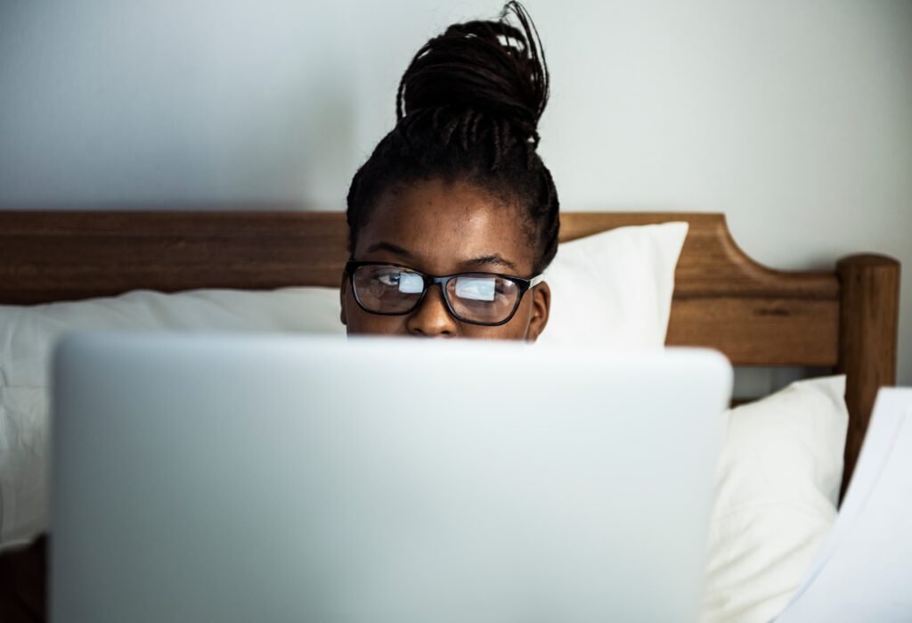 Night Shift and Eye Health: What Overnight Work Does to Your Vision and What to Do About It 2 woman working bed 1